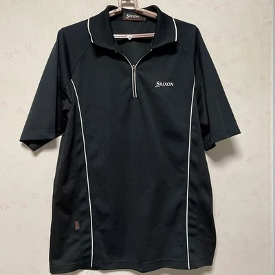 Camisa de golf Srixon negra manga corta para hombre malla axila talla 100 cm Foto 1 de 4