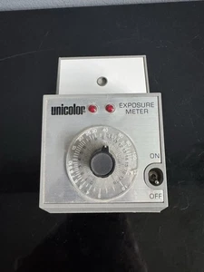 Esposimetro vintage UNICOLOR - a batteria usato una volta fotografia camera oscura - Foto 1 di 4