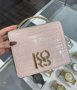 Neu mit Etikett Michael Kors kleine geprägte Cabrio-Umhängetasche Pulver rot - Bild 1 von 7