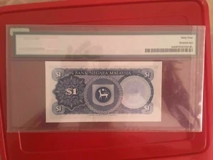 Malaysia RM1 ismail B94 002375 PMG 64 Gabenor first series - Picture 1 of 2