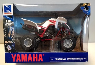 NEW RAY 1:12 DIE CAST ATV QUAD YAMAHA RAPTOR  660R BIANCO E ROSSO  ART 57503 - Immagine 1 di 2
