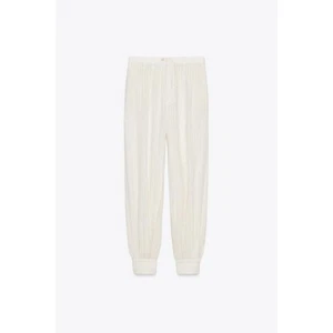 PANTALÓN CON PUÑOS A RAYAS COLECCIÓN ZARA ZW - Imagen 1 de 6