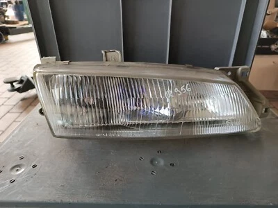 Original Kia Sephia Scheinwerfer rechts SAMDO 0K24J51020R - Bild 1 von 4