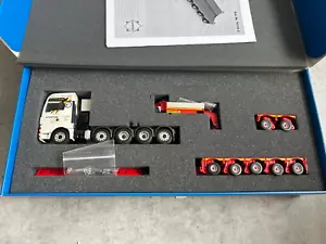 Conrad 1:50 MAN TGX 10x4-6 + faymonville variomax - Foto 1 di 2