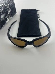 Chaqueta Recta Oakley Negro Mate Bronce Versión 1999 Sin Llamas Hulk Hogan NUEVA - Imagen 1 de 7