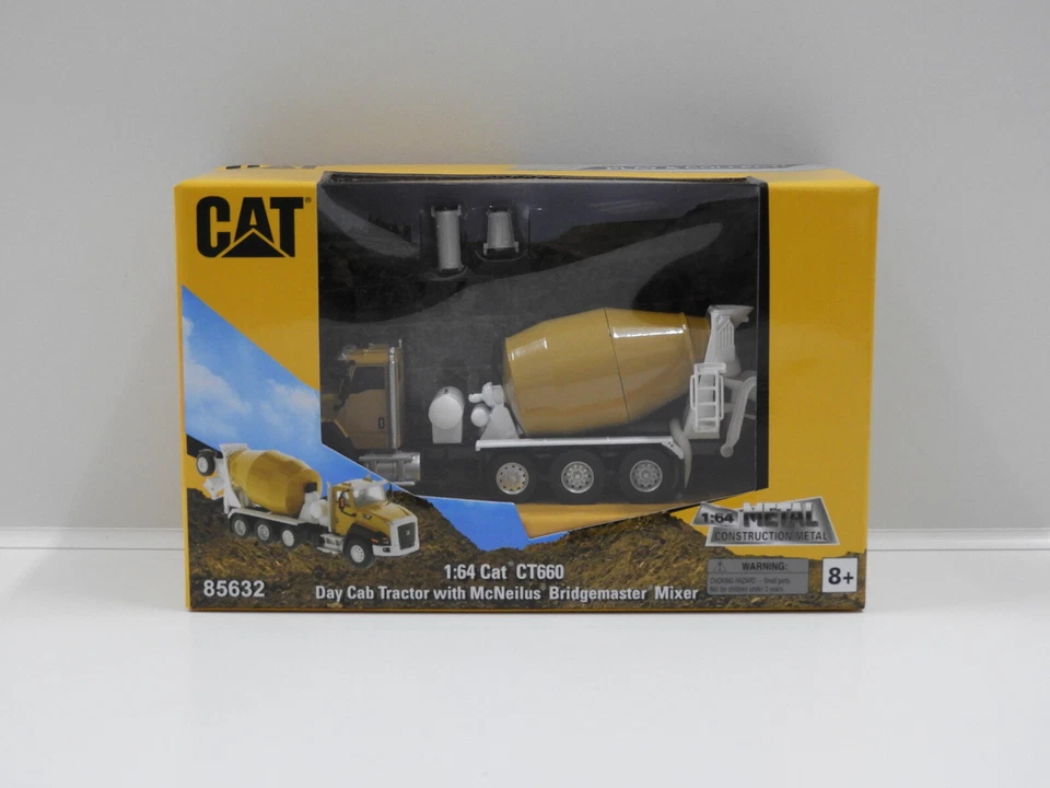 1:64 Cat CT660 Day Cab Tractor with McNeilus Bridgemaster Mixer Diecast Masters  - image 1 of 1