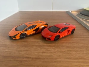 Diecast Burago/Rastar 2x Lamborghini's Aventador/Sian FKP 37 Orange 1:43 - Imagen 1 de 6