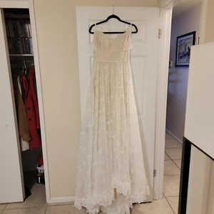 wedding dress. Cocomelody. Size 8, nude, never been worn - Picture 1 of 3