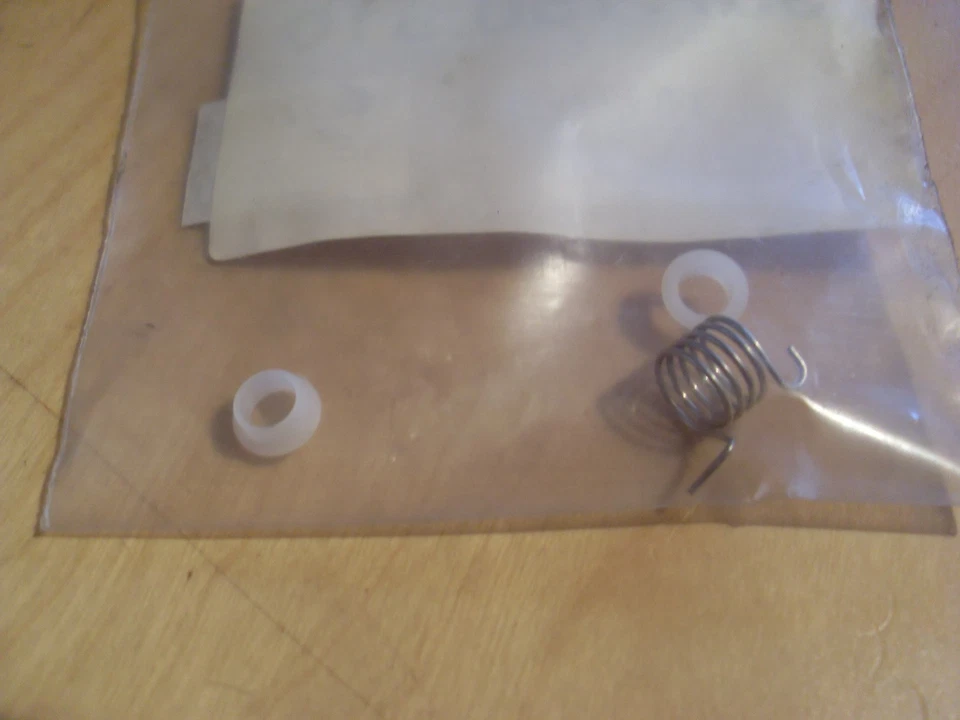 Torsion Spring Carburettor dolmar 115i (957150310) - Image 1 of 1