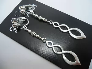 A PAIR OF TIBETAN SILVER LONG TWISTY CLIP ON EARRINGS. NEW. - Picture 1 of 1