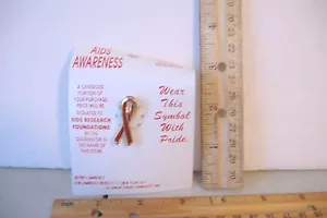 ~RED RIBBON PIN~AIDS AWARENESS~0101~LAWRENCE BENTLEY CO~KAUFMANNS~ - Picture 1 of 3