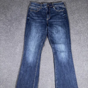 Pantalones de mezclilla elásticos American Eagle tiro alto ajustados para mujer talla 12 corte boot - Imagen 1 de 9