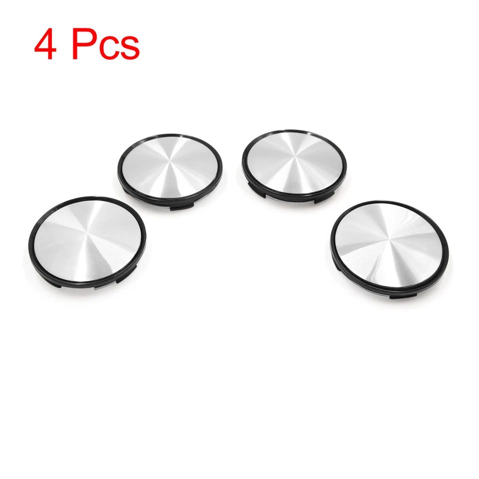 Tapacubos central de rueda de neumático de coche 4 asas de 63 mm de diámetro con calcomanía de insignia tono plateado Foto 1 de 4