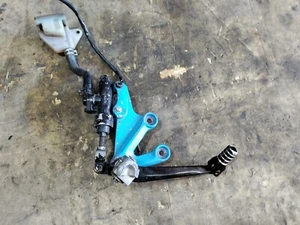 2004-2005 suzuki gsxr 600 750 oem driver rearset with footpeg healguard damaged - Picture 1 of 6