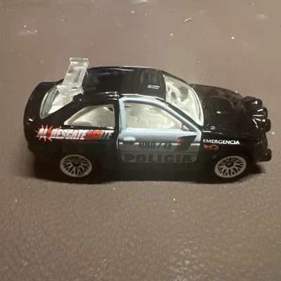 1996 Hot Wheels Ford Escort Rally Uno Ze Policia Police Car Black & White w/LW  - Image 1 of 3