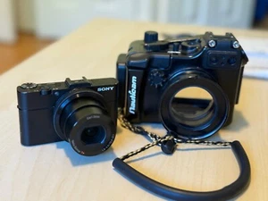 NAUTICAM NA-RX100 II UNDERWATER HOUSING with SONY DSC RX100 II DIGITAL CAMERA - Photo 1 sur 10
