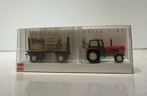 Tractor Busch H0 42834 con cartel embalaje original - Imagen 1 de 3
