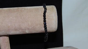 PULSERA VINTAGE DE CUENTAS STRECH COLOR NEGRO - Imagen 1 de 4