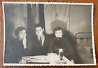Affectionate gentle man with women in the room Vintage photo