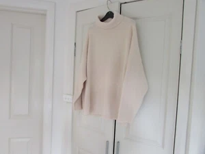 Ladies Oversized Polo Neck Rib Jumper Preview Cream Acrylic, Polyester & Nylon - Picture 1 of 11