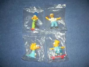 Vintage 1990 Homer Marge Maggie & Bart Simpson Skateboard PVC Figuren versiegelt - Bild 1 von 3