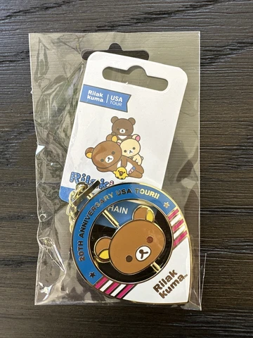 NIB Rilakkuma 20th Anniversary USA TOUR San-X  Spinning Bear Enamel Keychain Cover