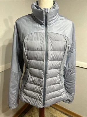 Chaqueta acolchada de plumón azul claro Lululemon con capucha y paneles laterales, talla 10 Foto 1 de 4