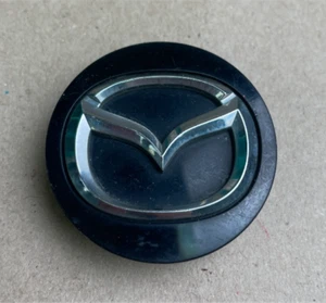 Mazda OEM Chrome On Black Center Cap. #BBM2-37-190 2-1/4" Diameter - Picture 1 of 2