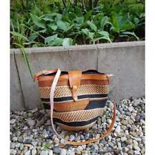 Woven sisal bag with leather strap