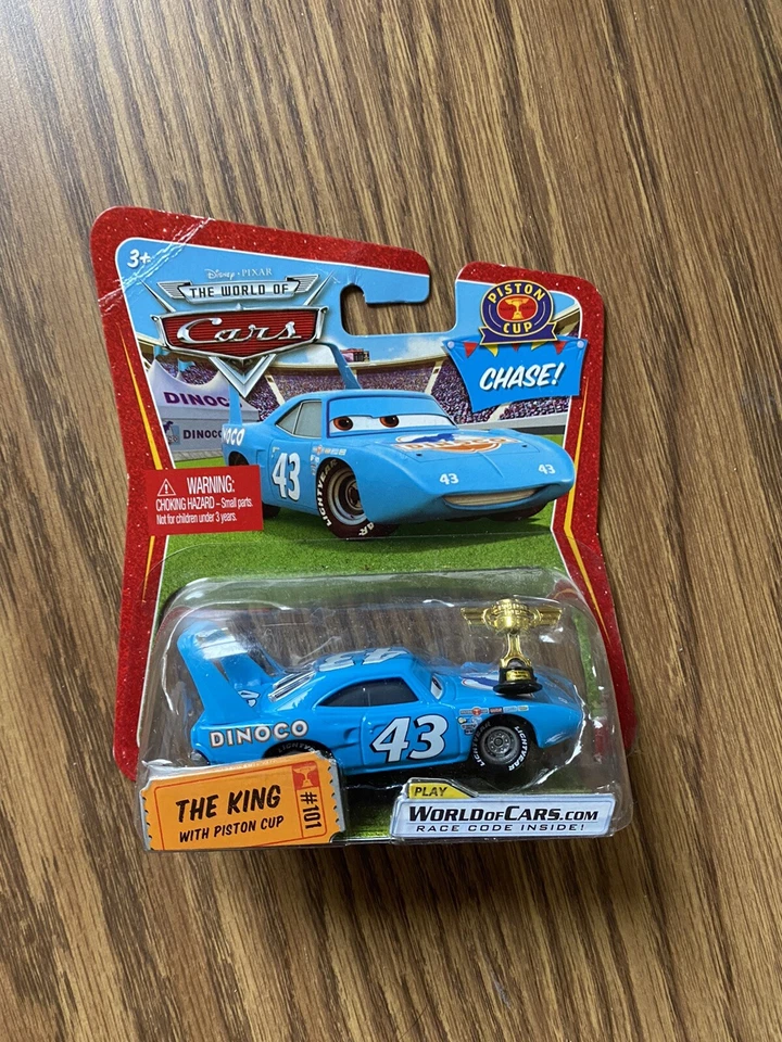 CARROS DISNEY PIXAR PERSIGUE AL REY CON TAZA DE PISTÓN 101 Foto 1 de 1