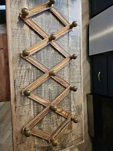 Expanding Stained Wooden Wall Hanging Coat Rack With 13 Green Stained Knobs - Picture 1 of 5