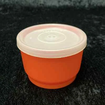 Contenedor de almacenamiento de bocadillos Tupperware naranja 1229-35 con tapa 297-36 vintage Foto 1 de 4