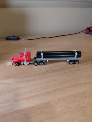 Vintage Road Champs Semi Trucks Red Flat Bed - Mack - Pipe/culvert Load - Image 1 of 4