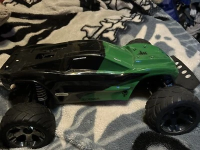 Traxxa TRX67064-1R Rustler 4x4 Brushed Ready to Run Stage Truck - Red - Image 1 of 4