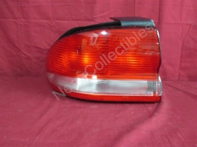 Luz de lámpara trasera izquierda NOS OEM Chrysler Concorde 1993-97 Foto 1 de 4