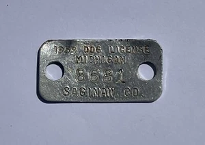 1959 Condado de Saginaw, Michigan, EE. UU. licencia de etiqueta fiscal para perro de metal - Imagen 1 de 2