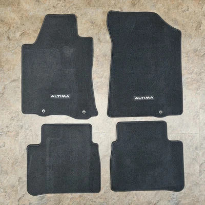 Juego de 4 alfombrillas Nissan Altima 999E2 originales OEM negras carbón W013 - 2018 Foto 1 de 4