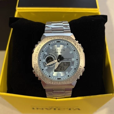 Reloj Invicta Activa X - 45,5 mm, esfera azul, caja y correa plateadas (ACWM423-003) Nuevo Foto 1 de 4