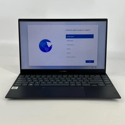 Asus Zenbook 14 Gris FHD i7-1065G7 1.30GHz 16GB 512GB Muy Bueno - PUNTOS BLANCOS Foto 1 de 4