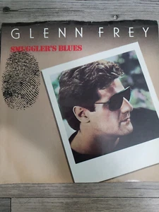 THE Eagles Glenn Frey (solo) Smuggler's Blues  45 RPM  W/Picture sleeve JUKEBOX - Picture 1 of 9