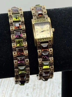 "Juego de reloj y pulsera Heidi Daus, Swarovski púrpura/verde, batería nueva, tamaño 6,5""" Foto 1 de 4