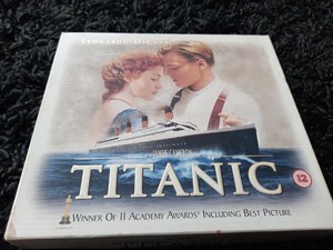 Titanic (VHS)  includes Exclusive 35mm film cell and Collector Cards 