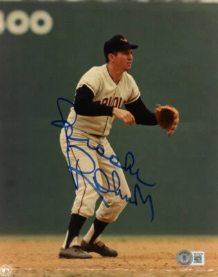 BROOKS ROBINSON SIGNED AUTOGRAPHED 8x10 PHOTO BALTIMORE ORIOLES HERO BECKETT BAS - Image 1 of 2