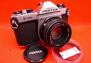 Pentax K1000 con obiettivo SMC Pentax A 50mm 1:2. Dai un'occhiata! Fallo tuo! - Foto 1 di 12