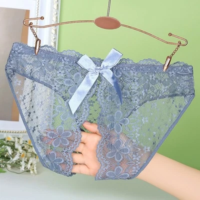 Bragas sensacionales sin entrepierna para mujer en elegante material de encaje y malla Foto 1 de 4