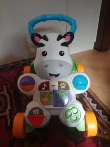 Zebra primi passi Fisher Price cavalcante con rotelle per bambini infanzia gioco - Foto 1 di 2