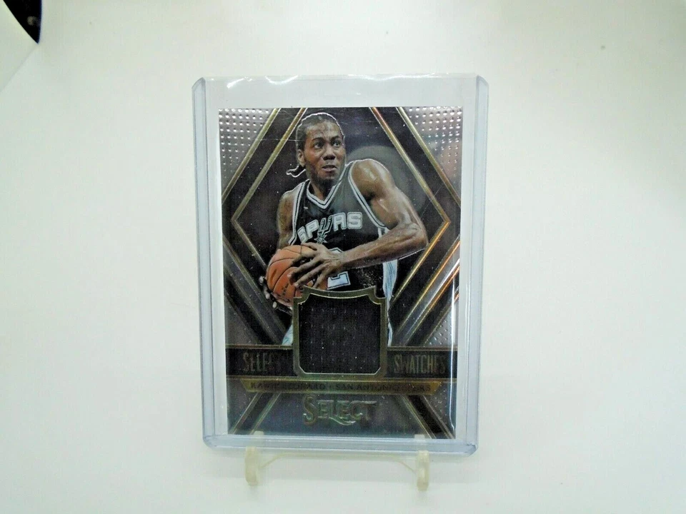 2014-15 PANINI SELECT SWATCHES KAWHI LEONARD JERSEY PATCH RELIC SILVER PRIZM /75 - Image 1 of 4