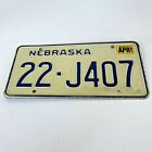 1987 Nebraska License Plate 22-J407 White Blue Man Cave Garage Collector Vintage