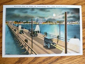 Municipal Pier at Night - St. Petersburg FL Sunshine City White Border Postcard - Picture 1 of 2