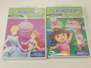 (2) LeapFrog Leapster Lernspiele Doras Camping Abenteuer/ Disney Princess  - Bild 1 von 2